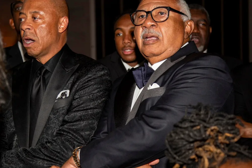 Bros. Samuel A. Hart, Sr. and Virgil Adams, in black tie at a chapter event.